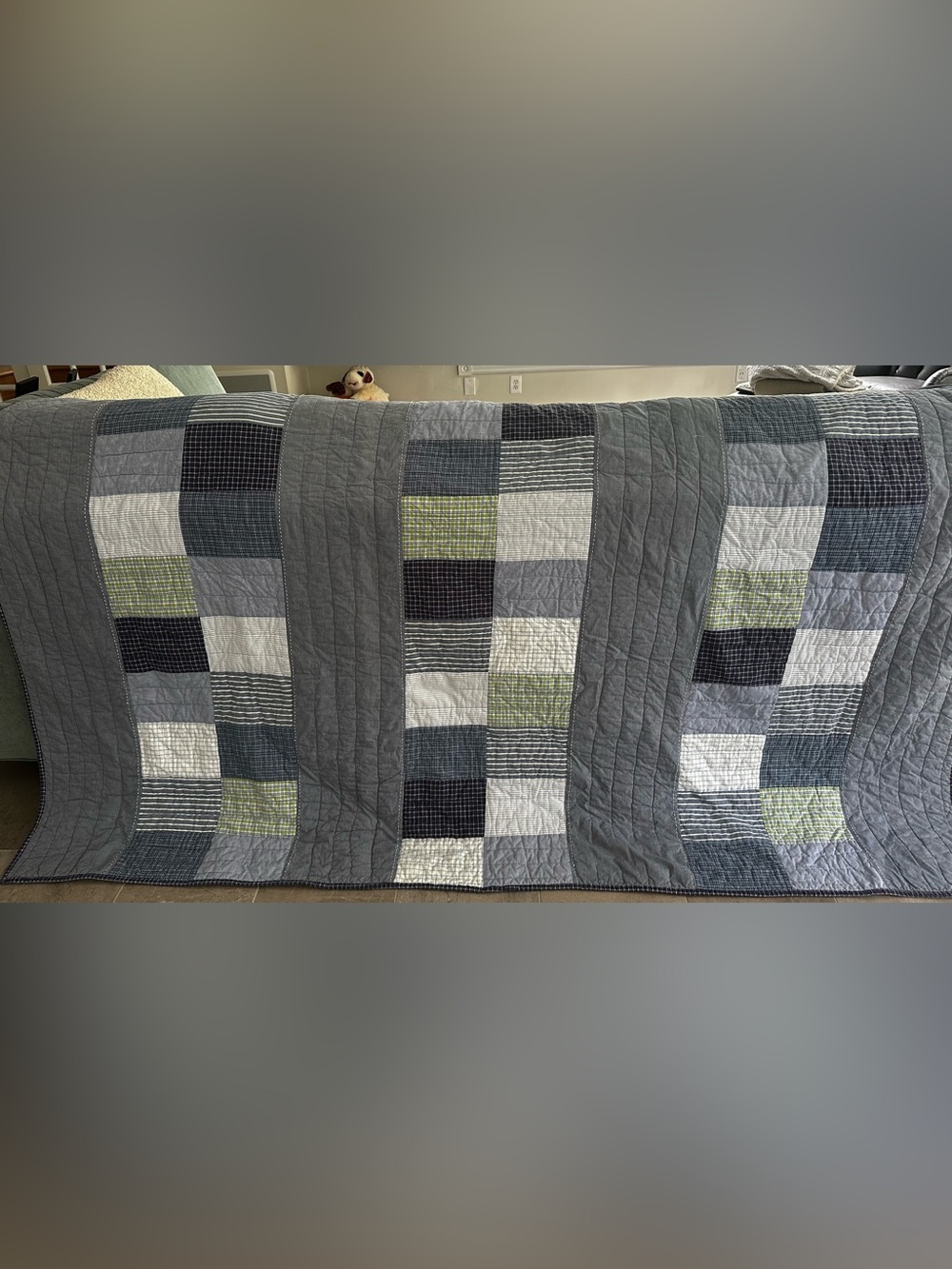 Pottery Barn Kids Reversible Patchwork Comforter with Green and Navy Accents.